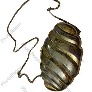 Gold and Silver Shell Clutch with a Vintage Touch